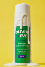 Olivia + Eve Advanced Antioxidant Cream bottle with white cream on a yellow background