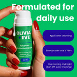 A person's hands with red nail polish hold a white and green pump bottle of Olivia + Eve Advanced Antioxidant Cream against a bright green background with white and purple text callouts.