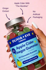 Bottle of Olivia + Eve Apple Cider Vinegar Gummies with text on a pink background