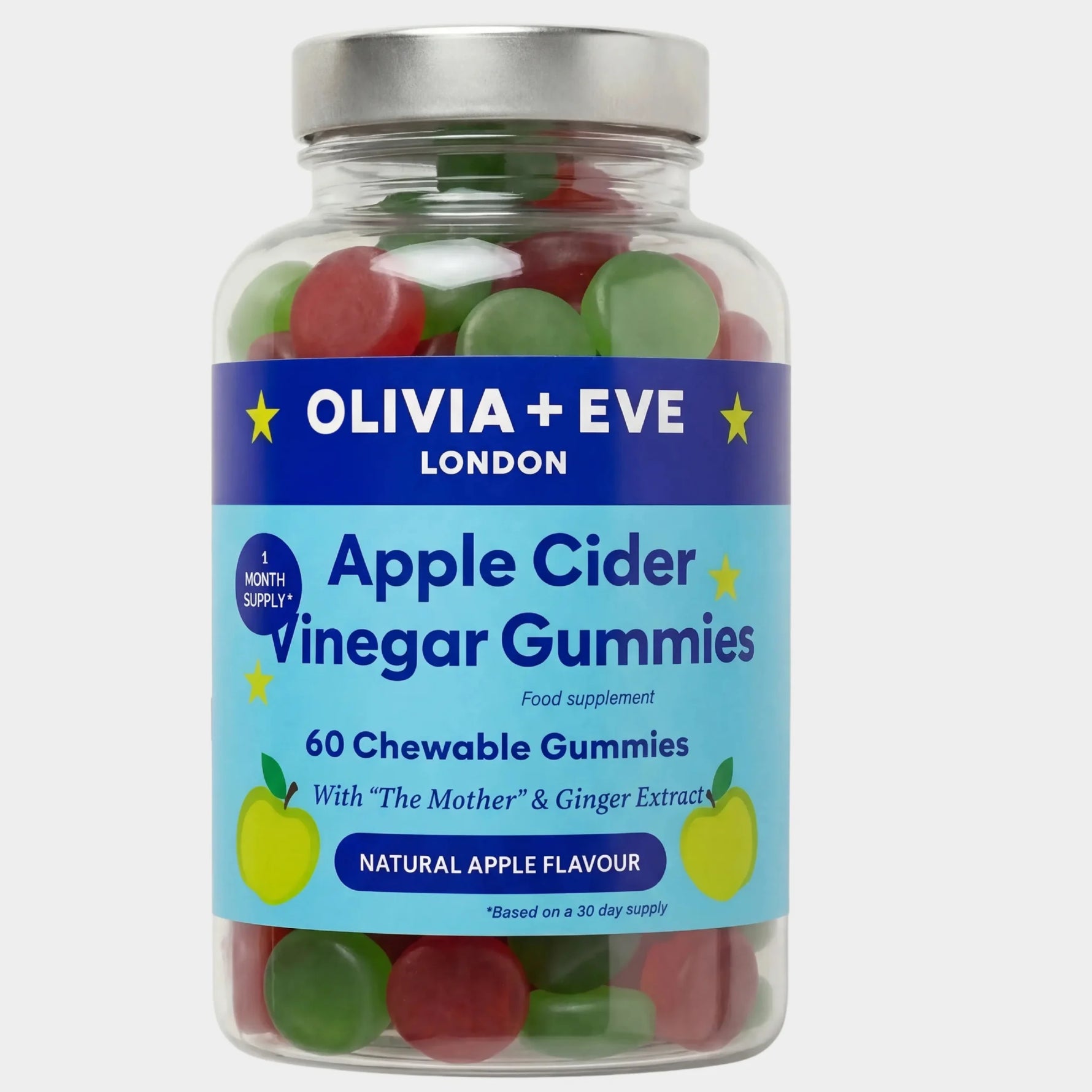 A clear plastic bottle of Olivia + Eve Apple Cider Vinegar Gummies with a silver cap and a blue and light blue label, filled with red and green round gummies, on a light gray background.