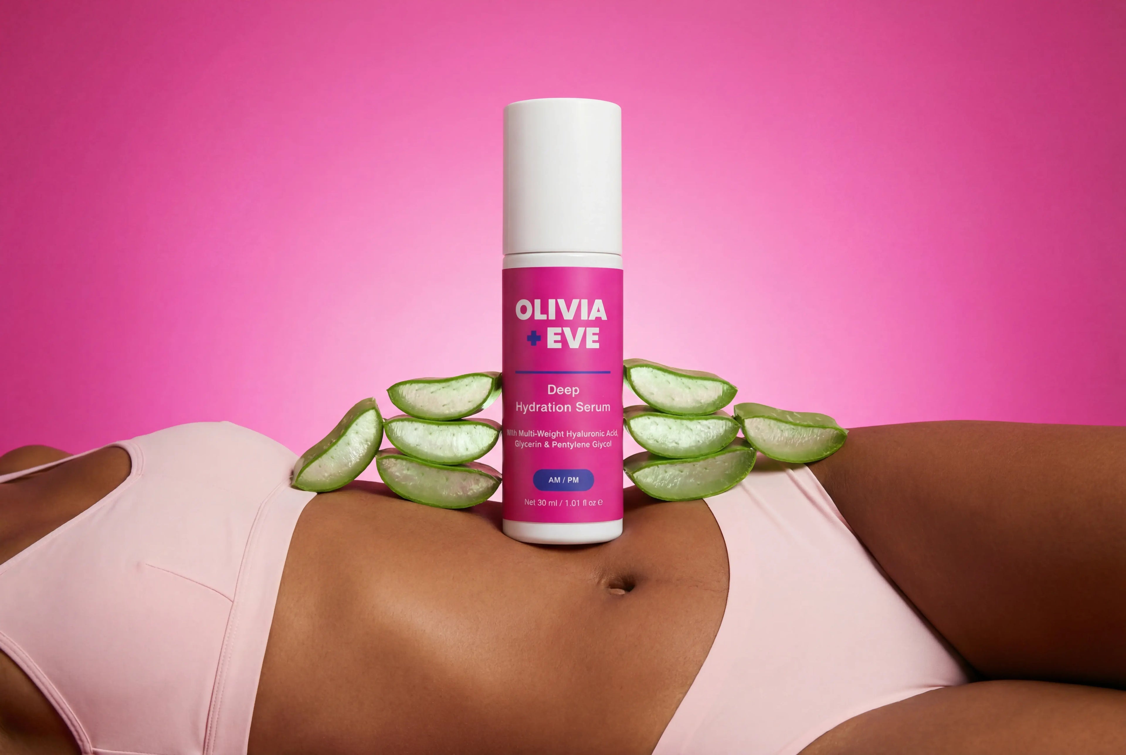 Olivia + Eve deep hydrating serum with aloe vera on a pink background