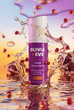 Olivia + Eve Gentle Retinol Serum with pomegranate seeds and water droplets on a colourful background