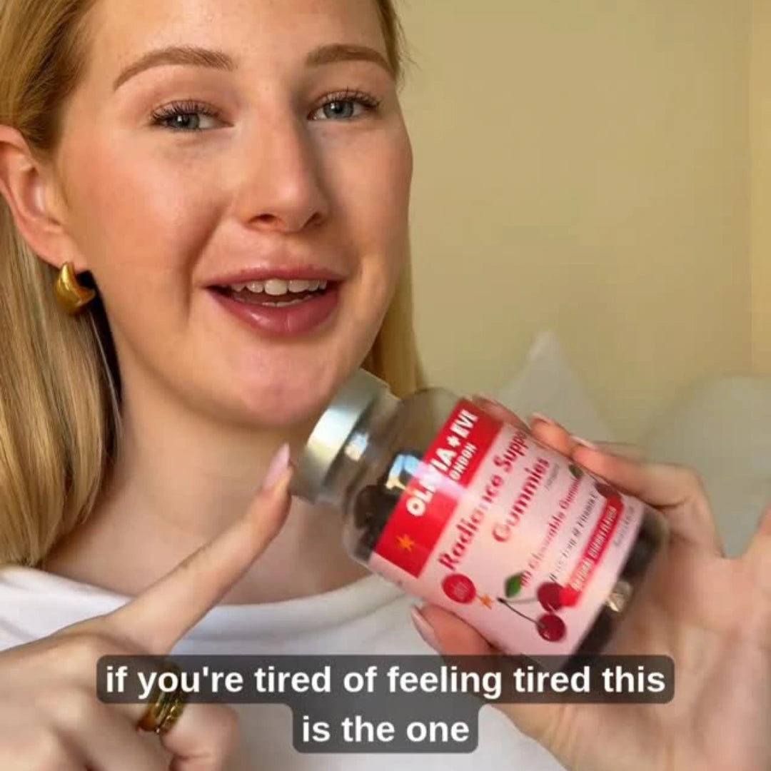 woman holding Olivia + Eve Radiance Support gummies