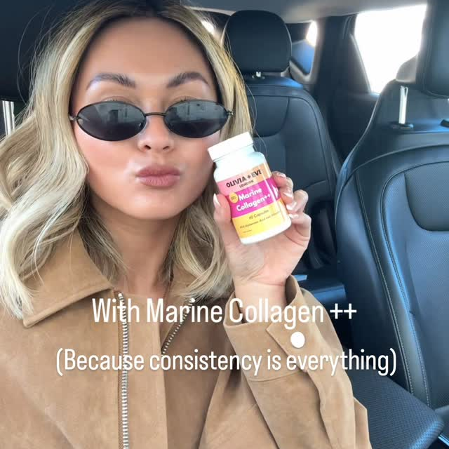Woman holding Olivia + Eve Marine Collagen++ capsules