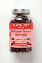 Jar of Olivia + Eve Radiance Support Gummies on a white background
