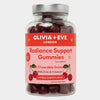 A clear plastic bottle of Olivia + Eve Radiance Support Gummies with a silver cap and a pink label featuring cherry illustrations, set against a light gray background.