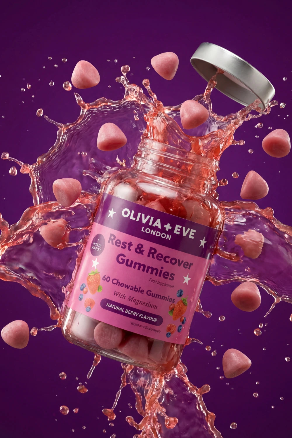 Olivia+Eve London Rest & Recover Gummies bottle with gummies splashing out on a purple background