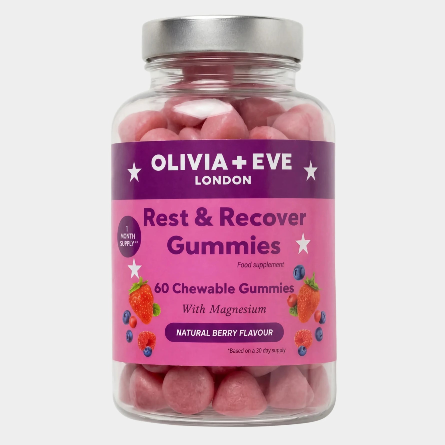 A clear plastic bottle of Olivia + Eve Rest & Recover Gummies with a purple and pink label, filled with pink chewable gummies, on a light gray background.