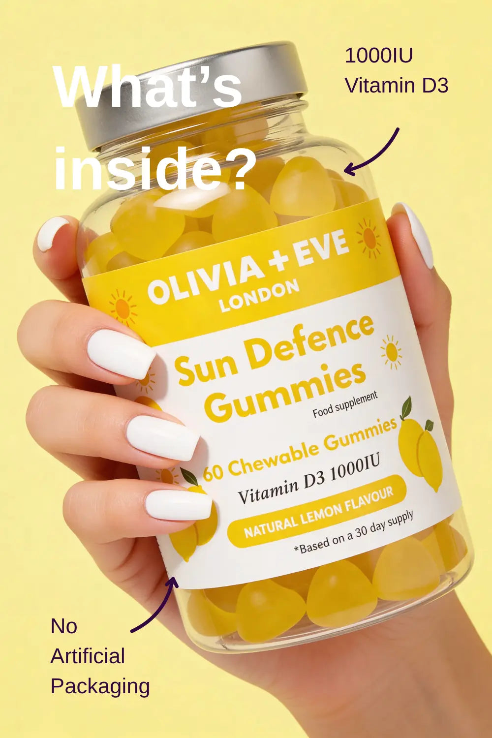 Hand holding a bottle of Olivia + Eve Sun Defence Gummies with lemon flavor on a yellow background.