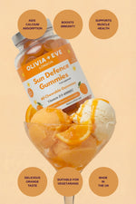 Olivia + Eve Sun Defence Gummies packaging with ice cream and orange slices on a beige background