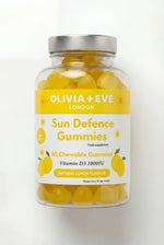 Bottle of Olivia + Eve London Sun Defence Gummies on a white background